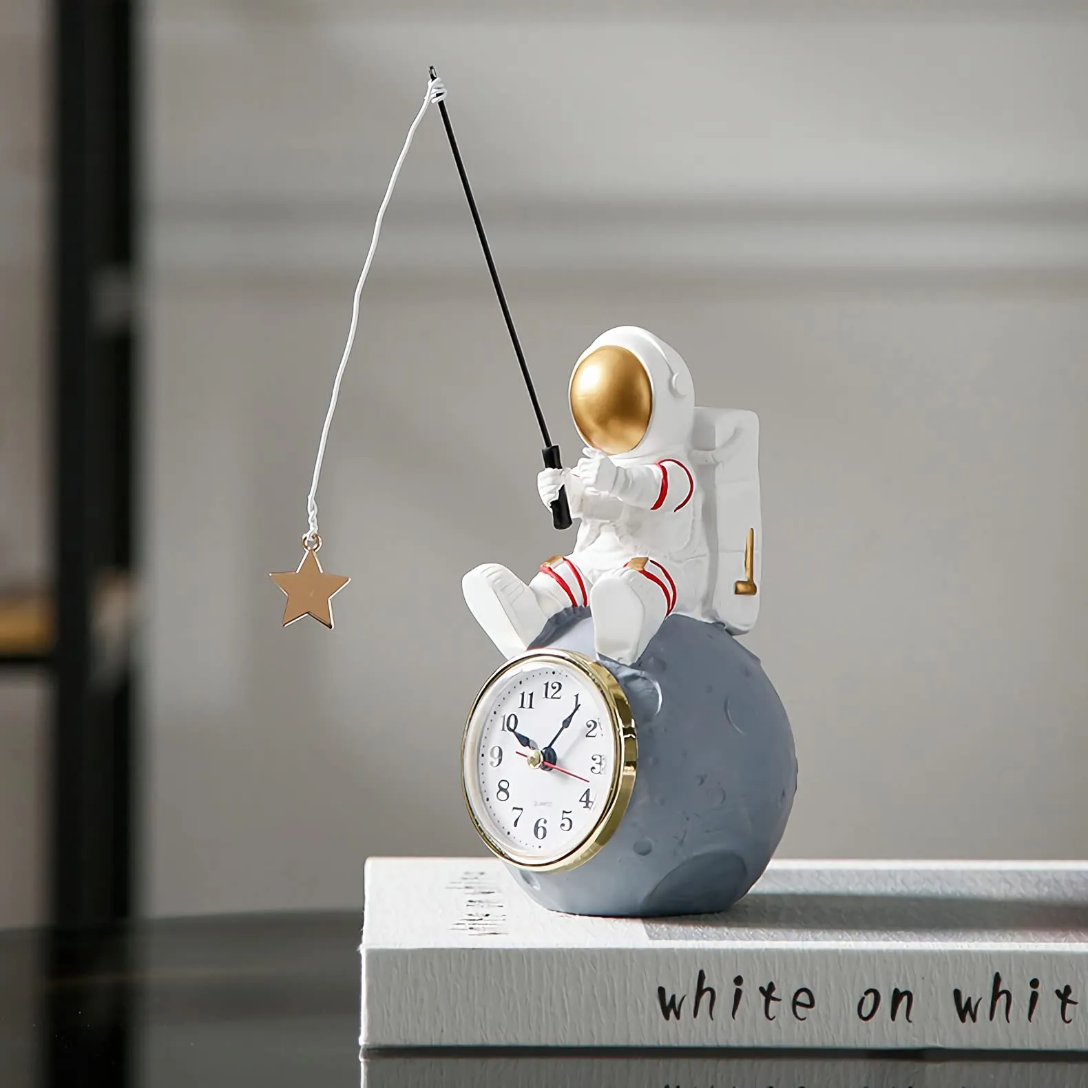 Astronaut Figure Clock for Desktop & Shelf, Battery Operated, Astronaut & Planet Figurine Statue for Office & Kids' Outer Space Themed Bedroom Decor, Decorative Small Table Clock, Fishing Star